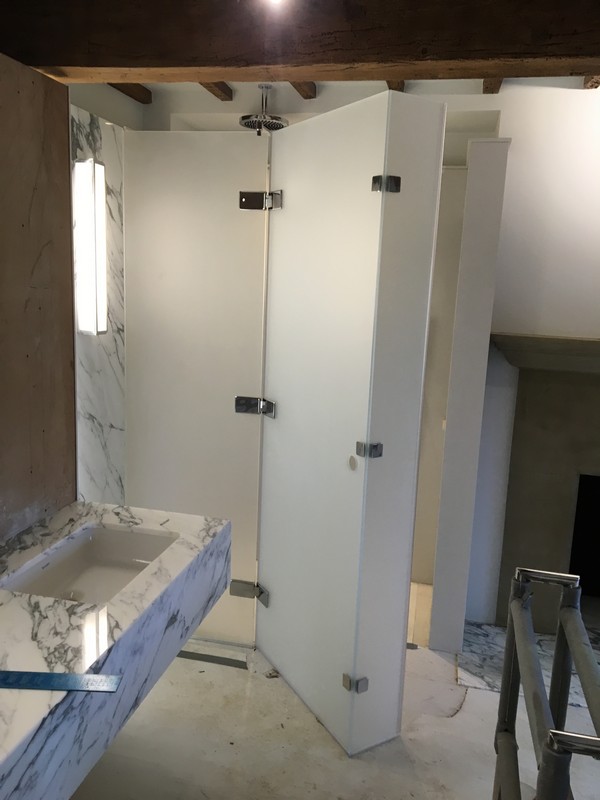 Bespoke frosted glass shower enclosure in Hammersmith luxury bathroom