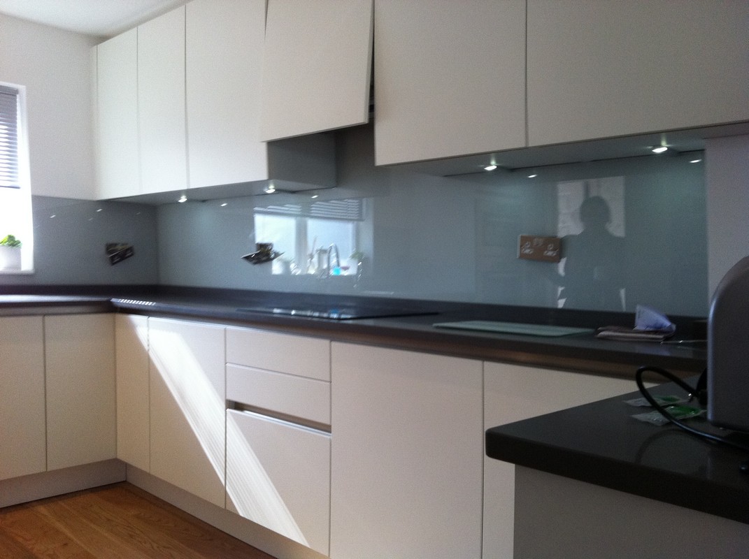 Grey glass kitchen splashback with LED lighting in Hammersmith